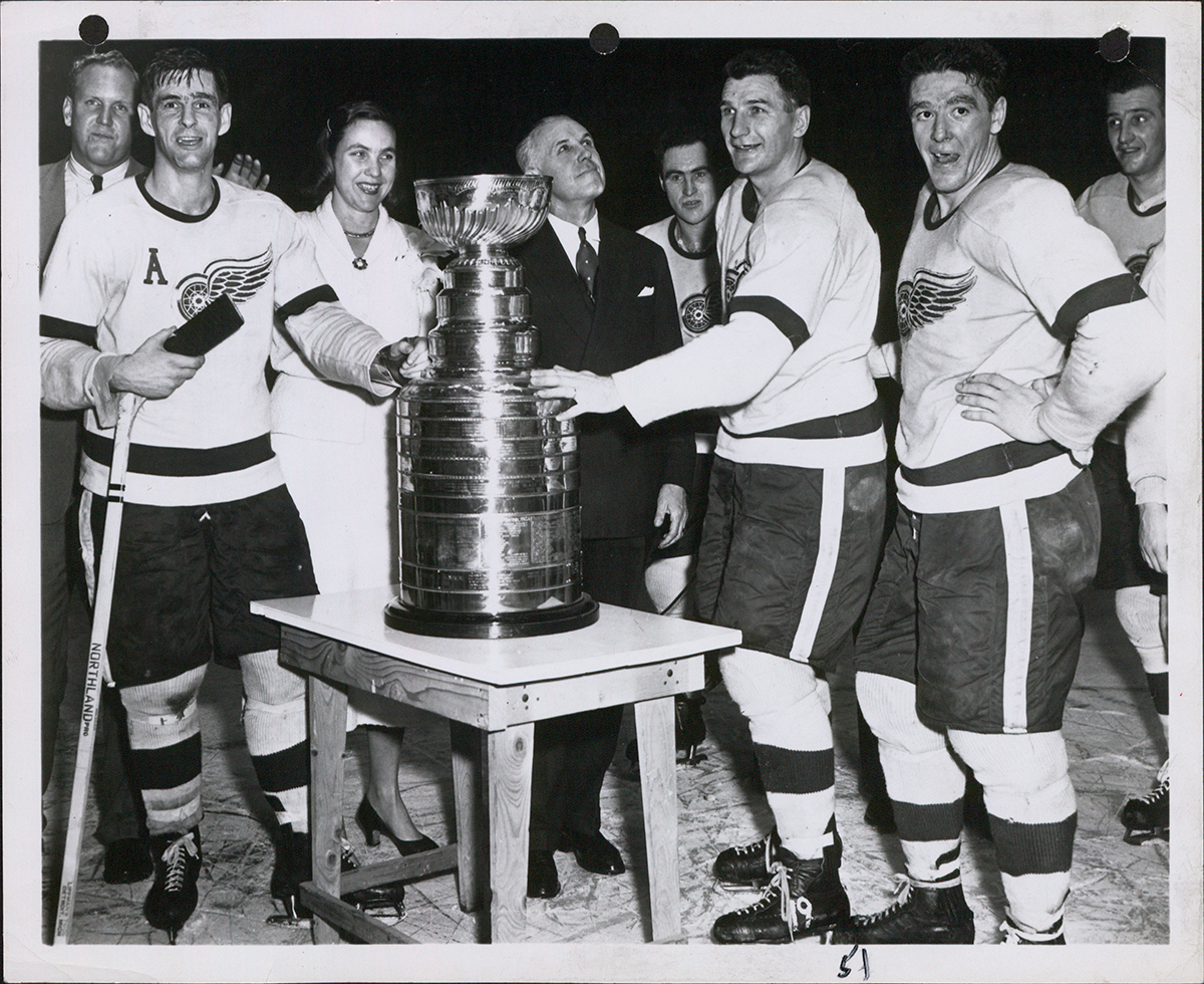 The 1953-54 Detroit Red Wings celebrating their Stanley Cup win.